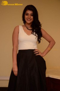 Telugu Actress Yamini Bhaskar Photoshoot in a white top and black skirt