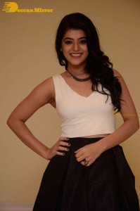 Telugu Actress Yamini Bhaskar Photoshoot in a white top and black skirt