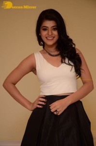 Telugu Actress Yamini Bhaskar Photoshoot in a white top and black skirt