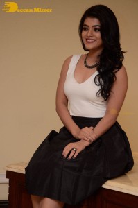 Telugu Actress Yamini Bhaskar Photoshoot in a white top and black skirt