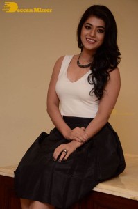 Telugu Actress Yamini Bhaskar Photoshoot in a white top and black skirt