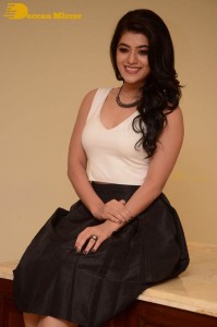 Telugu Actress Yamini Bhaskar Photoshoot in a white top and black skirt
