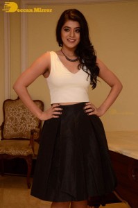 Telugu Actress Yamini Bhaskar Photoshoot in a white top and black skirt