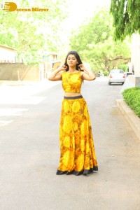 Telugu Actress Yamini Bhaskar in a yellow dress