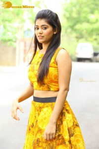 Telugu Actress Yamini Bhaskar in a yellow dress