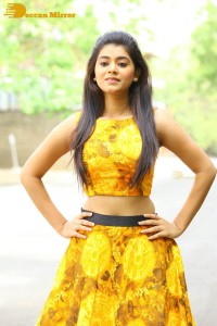 Telugu Actress Yamini Bhaskar in a yellow dress