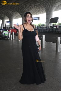 actress Yamini Malhotra in a noodle strap black dress