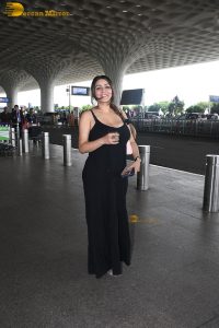 actress Yamini Malhotra in a noodle strap black dress