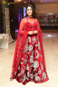 Indian actress yukti thareja pretty in a red lehenga choli