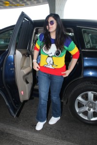 actress Zareen Khan in a colorful t-shirt and jeans at mumbai airport