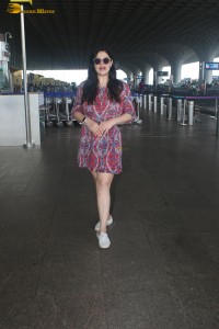 Indian actress Zareen Khan in a short summer dress