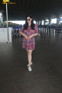 Indian actress Zareen Khan in a short summer dress