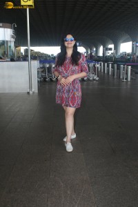 Indian actress Zareen Khan in a short summer dress