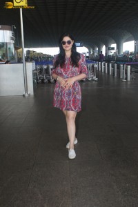 Indian actress Zareen Khan in a short summer dress
