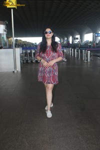 Indian actress Zareen Khan in a short summer dress