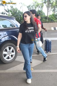bollywood star Zareen Khan cute in a black t-shirt and denim jeans at mumbai airport