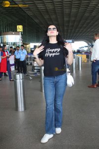 bollywood star Zareen Khan cute in a black t-shirt and denim jeans at mumbai airport