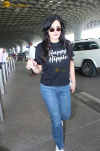 bollywood star Zareen Khan cute in a black t-shirt and denim jeans at mumbai airport