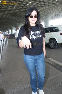 bollywood star Zareen Khan cute in a black t-shirt and denim jeans at mumbai airport