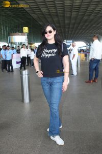 bollywood star Zareen Khan cute in a black t-shirt and denim jeans at mumbai airport